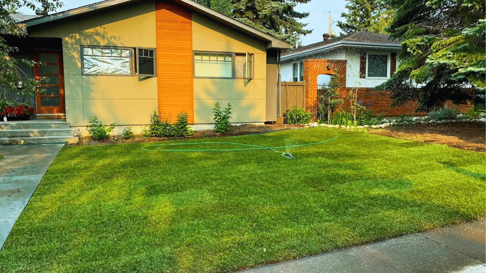 Landscaping property maintenance underway in Calgary yard